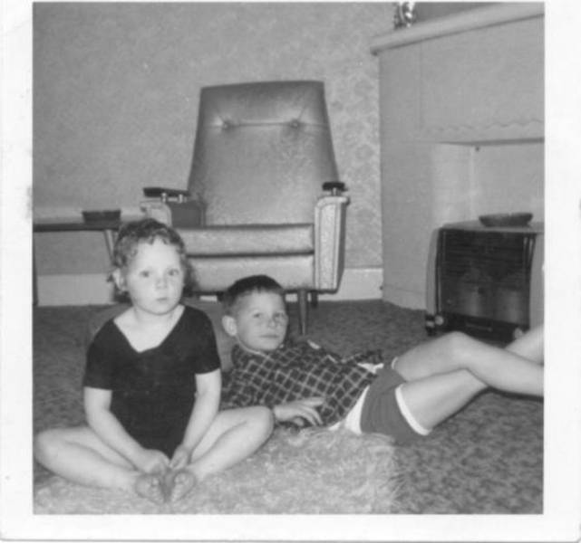 Donna in leotard with older brother